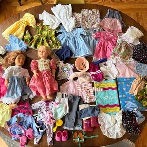 Two our generation dolls and lot of clothes accessories